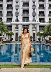 Sleeveless Silk Dress with V-Neckline and Gathered Drop Waist for Effortless Elegance